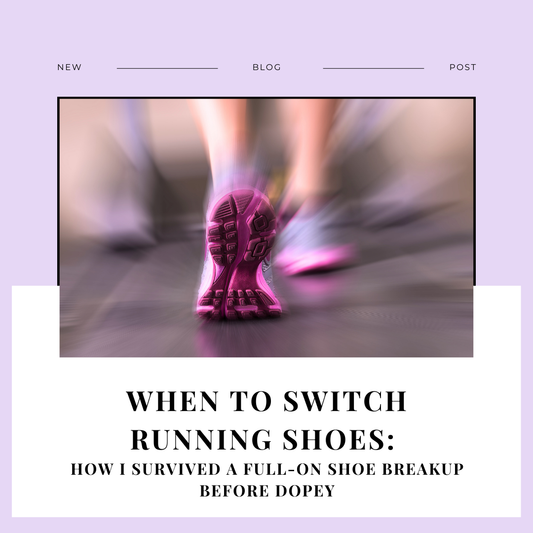 A pair of worn running shoes on pavement representing when to switch running shoes.